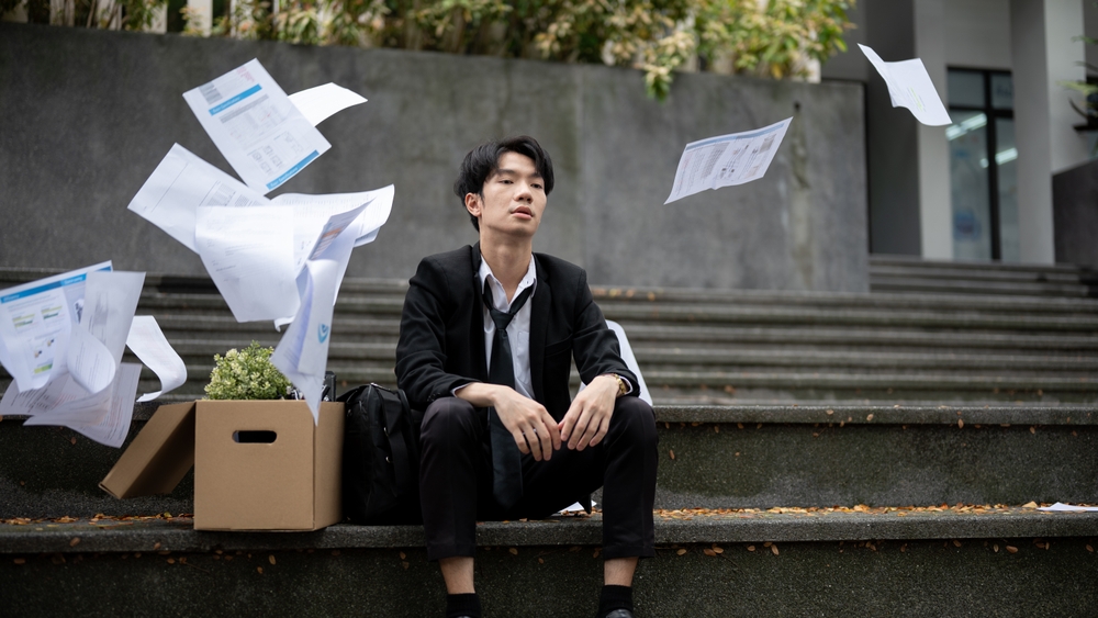 businessman sad on steps